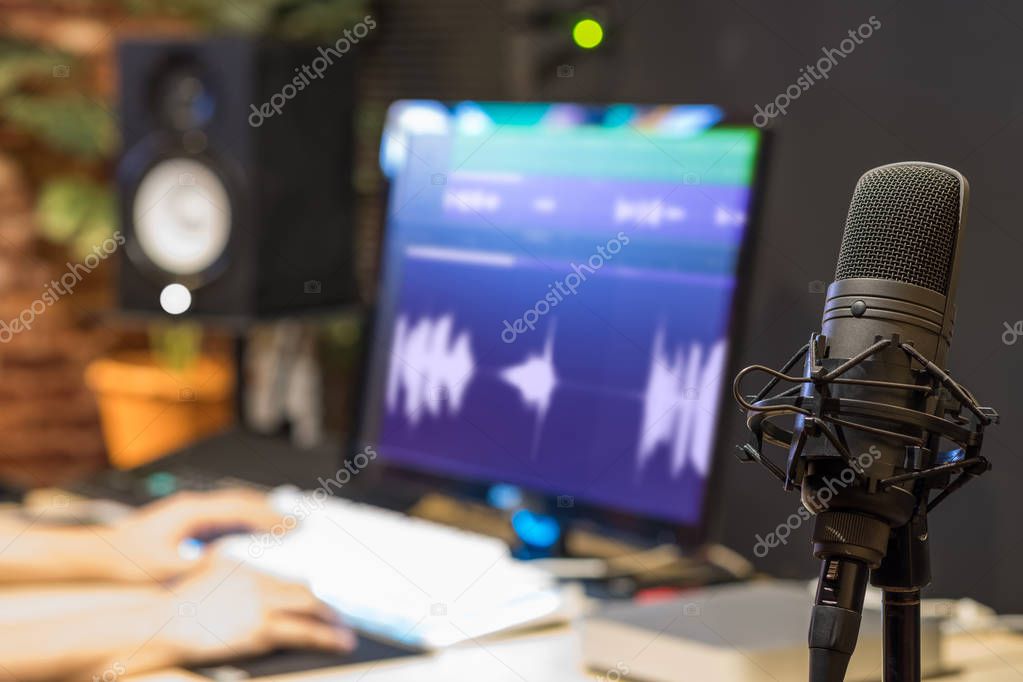 Audio waveforms on a computer screen in a music studio