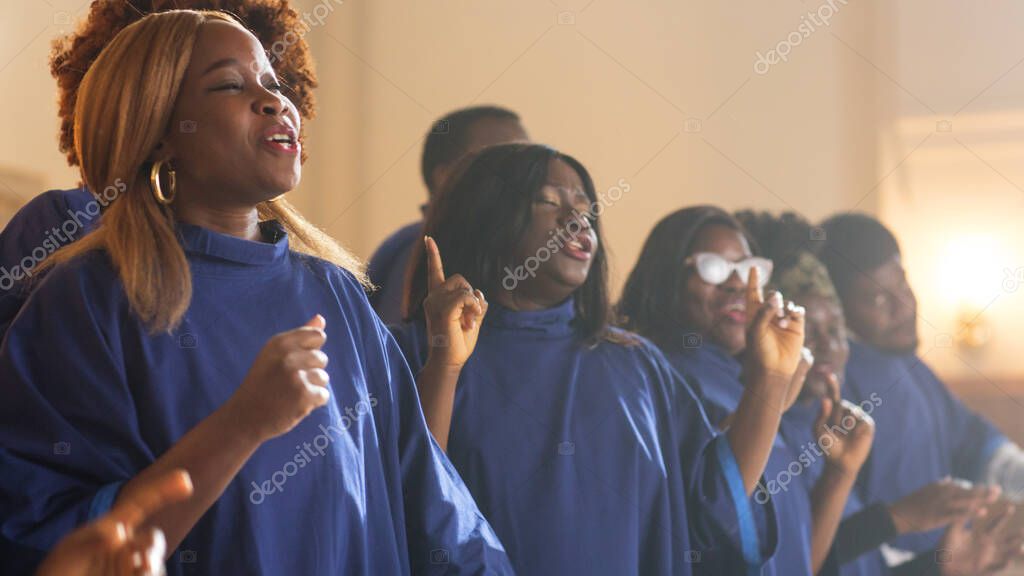 Gospel singers performing together on stage
